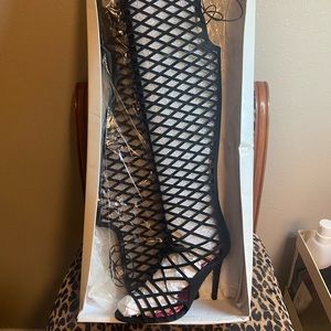 Over the knee cage boots